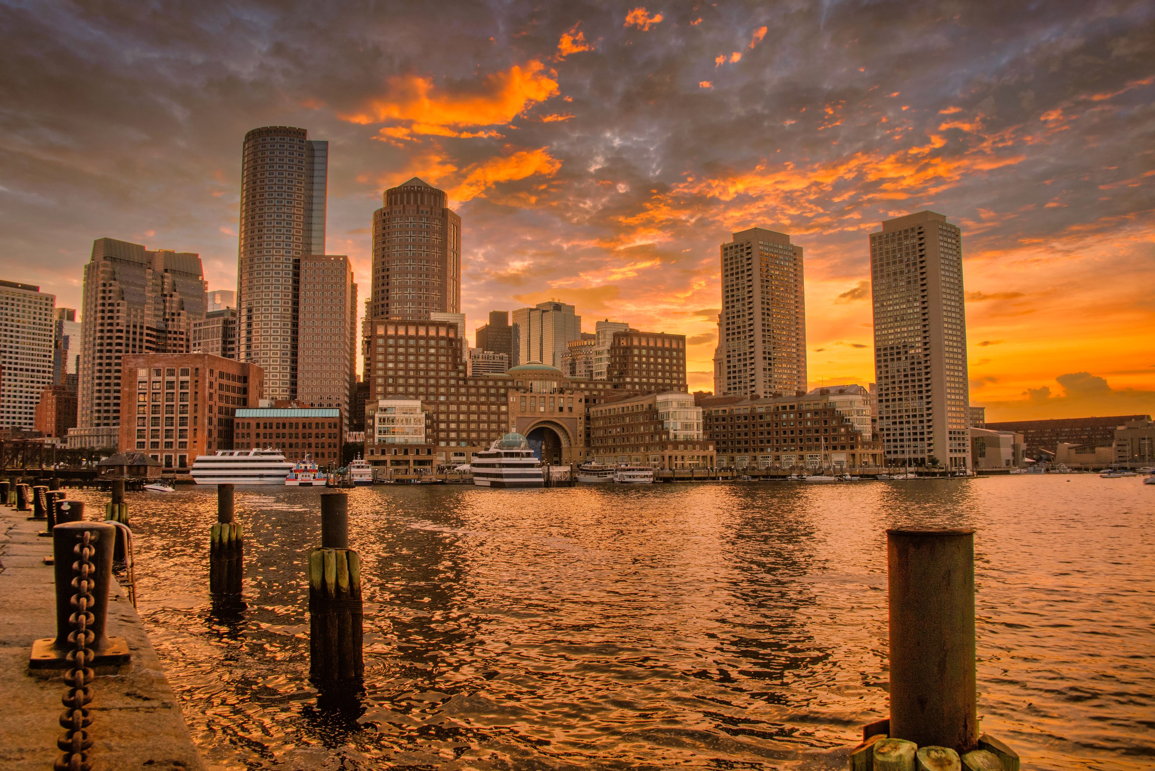 Boston skyline and harbor at sunset